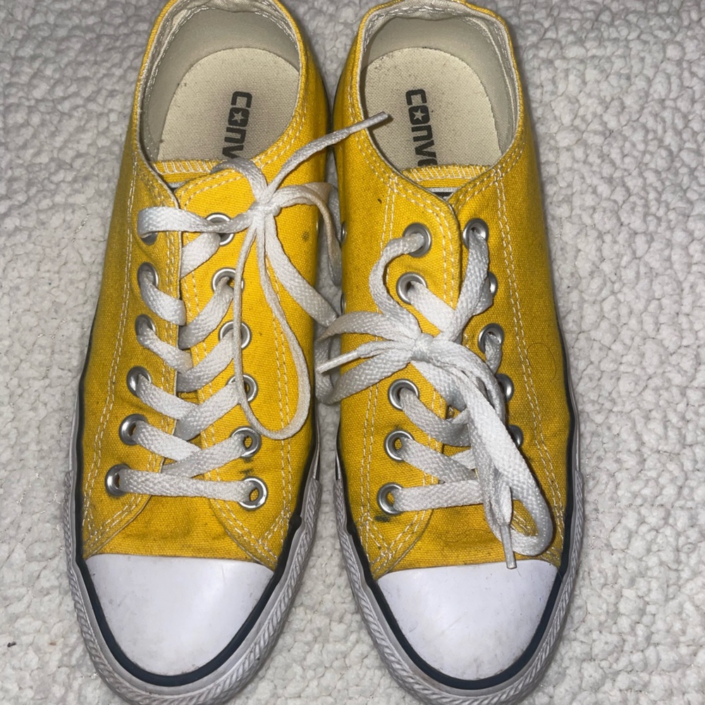 lightly worn low top yellow converse